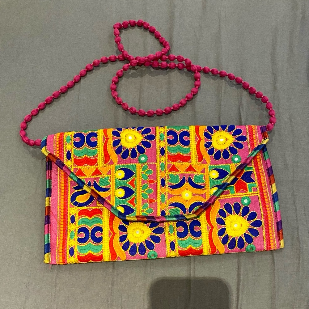 Embroidered clutch